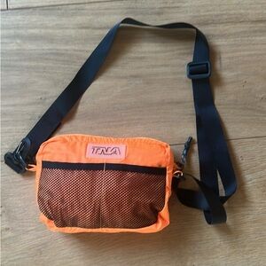 Aritzia TNA packable windjacket neon orange
